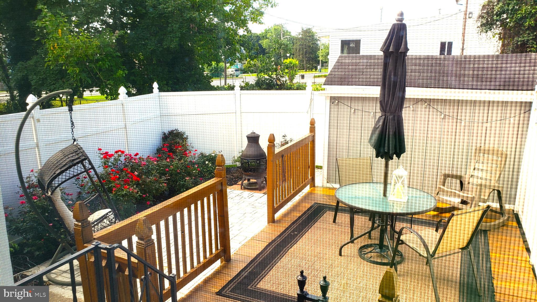 600 Braeside Road Baltimore, MD 21229 - Photo 30 of 32 BACKYARD DECK AND LANDSCAPING