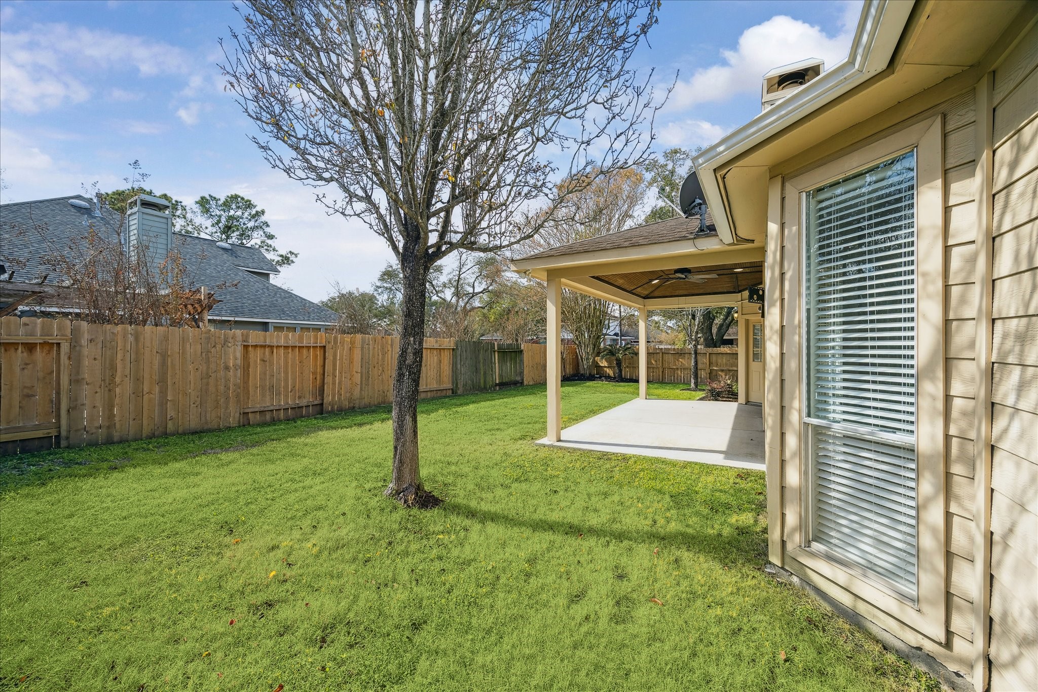 12831 Dove Point Lane Houston, TX 77041 - Photo 30 of 50 a view of a house with backyard and trees