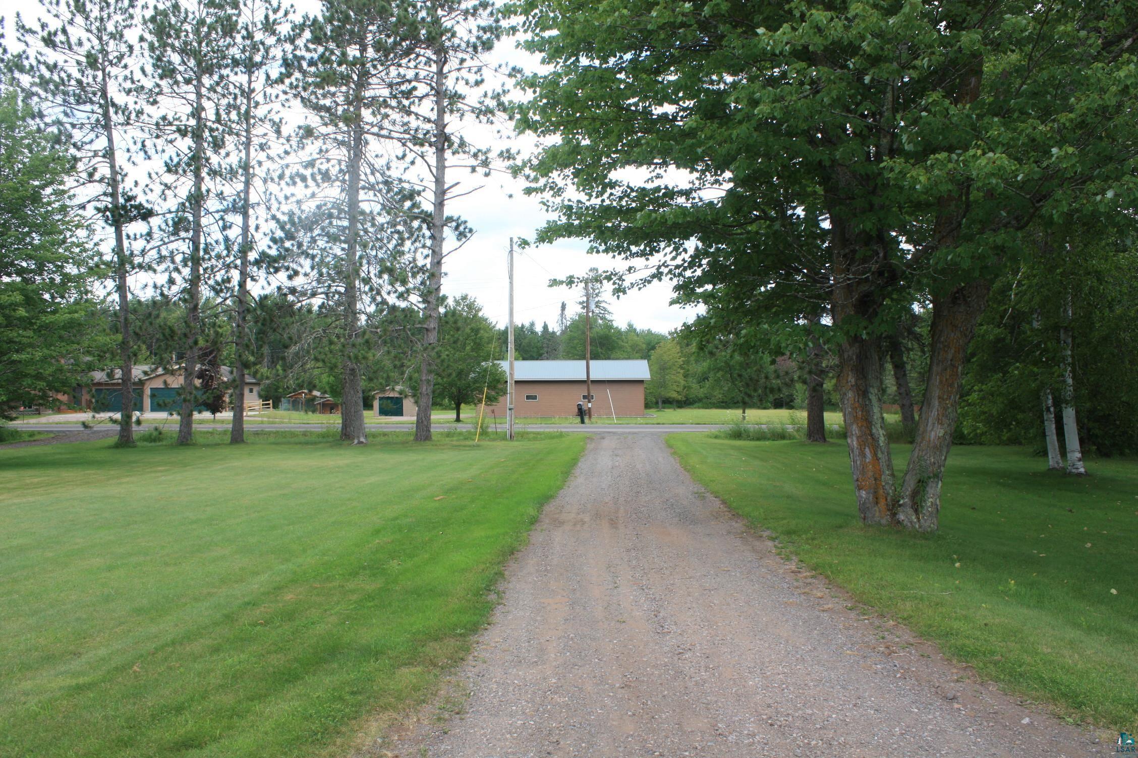 5322 East County Rd B South Range, WI 54874 - Photo 6 of 50 Surrounding community with a lawn