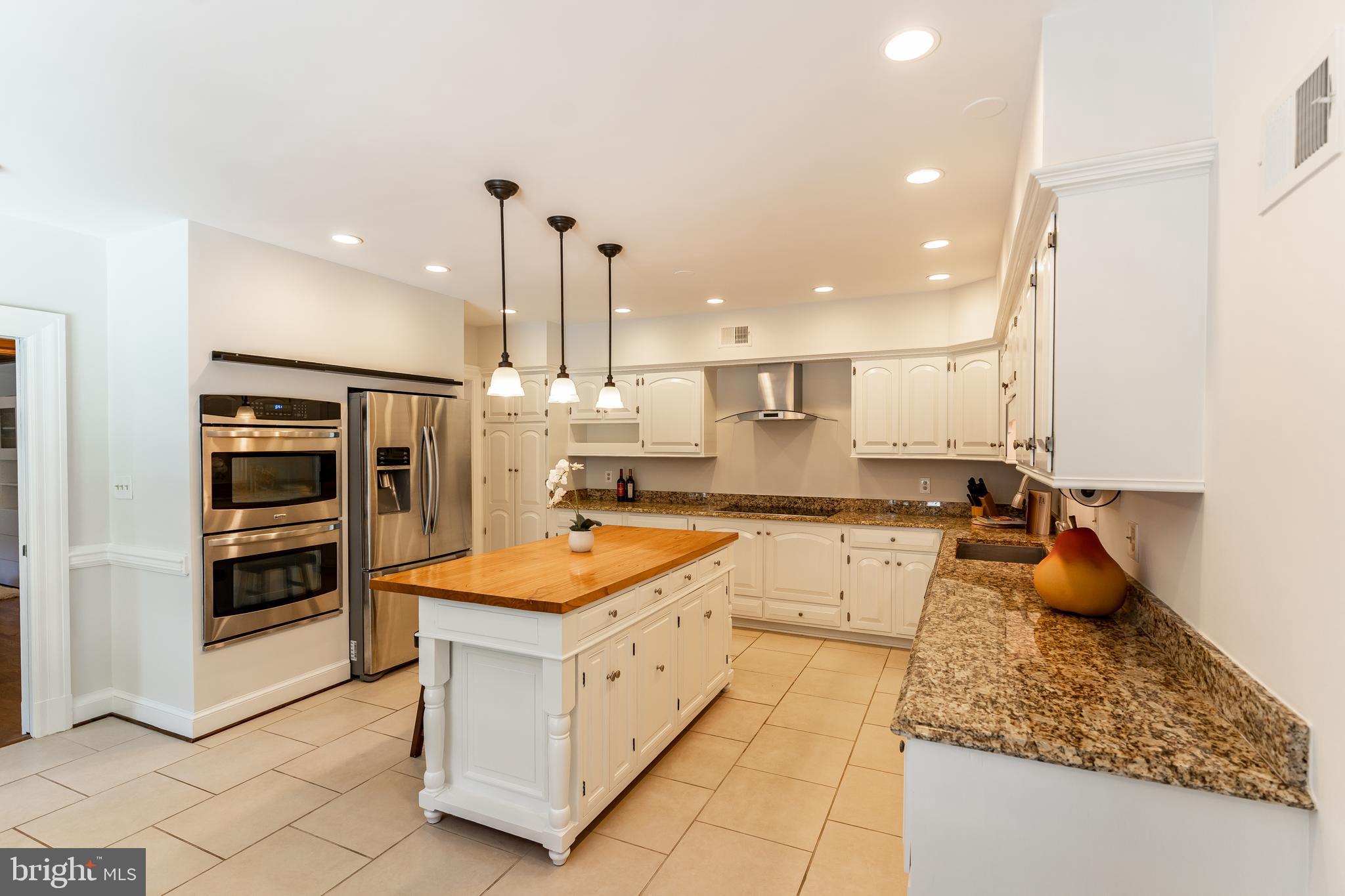 9901 Bluegrass Road Potomac, MD 20854 - Photo 7 of 29 Gourmet Kitchen w/ Stainless Steel Appliances