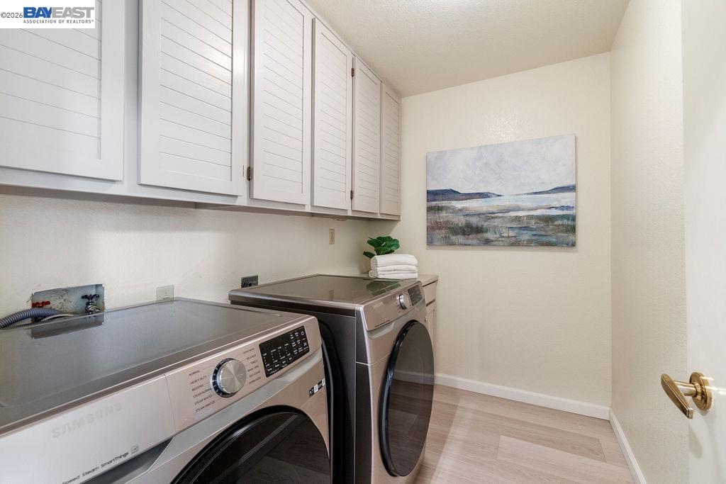 711 Lakemont Place, Unit 4 San Ramon, CA 94582 - Photo 11 of 28 a utility room with dryer and washer