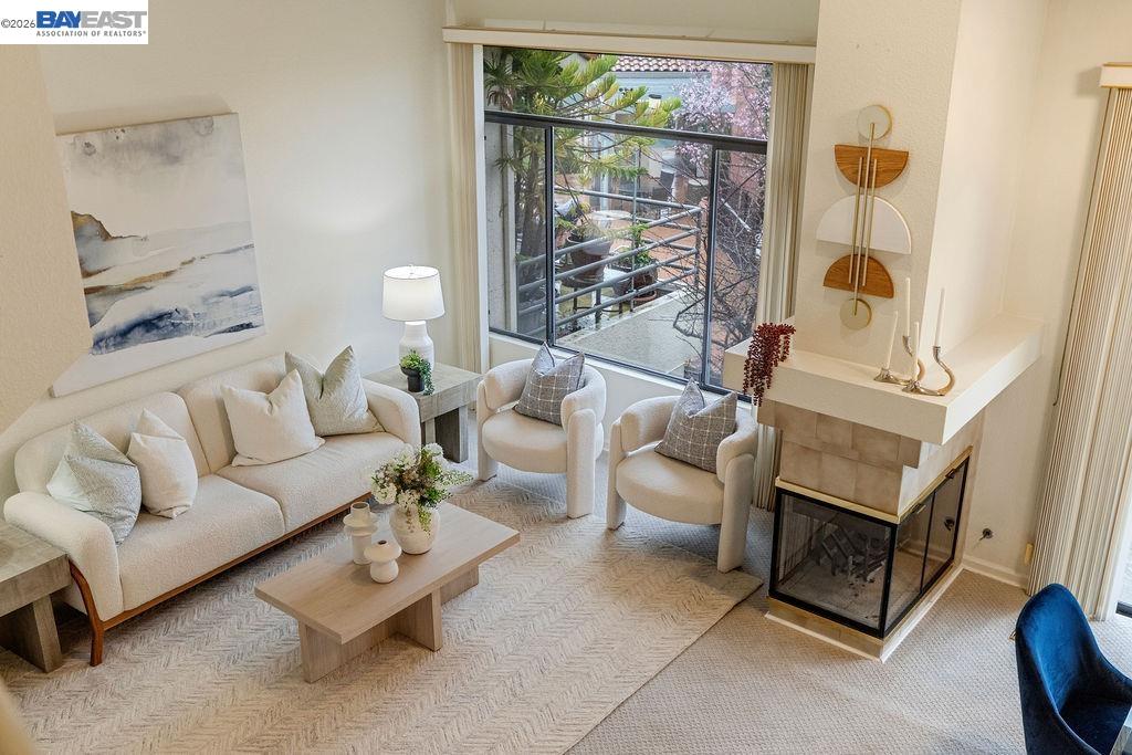 711 Lakemont Place, Unit 4 San Ramon, CA 94582 - Photo 21 of 28 a living room with furniture and a window
