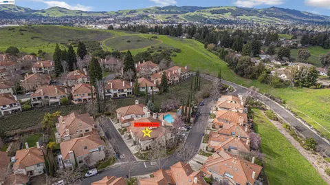 an aerial view of lake and residential houses