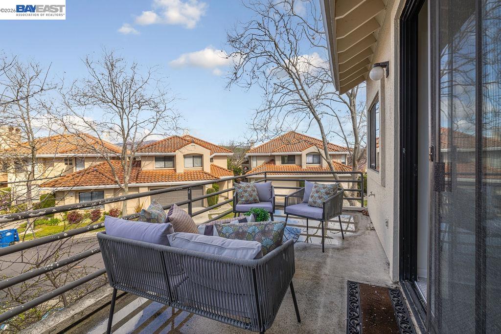 711 Lakemont Place, Unit 4 San Ramon, CA 94582 - Photo 26 of 28 a view of a chairs and table on the balcony