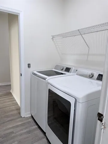 a utility room with dryer and washer