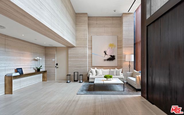 a view of a living room and dining room