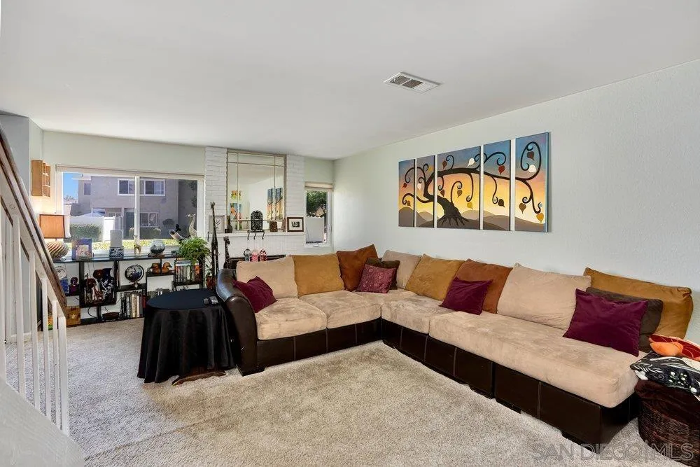 13358 Birch Tree Lane Poway, CA 92064 - Photo 3 of 16 a living room with furniture and a flat screen tv
