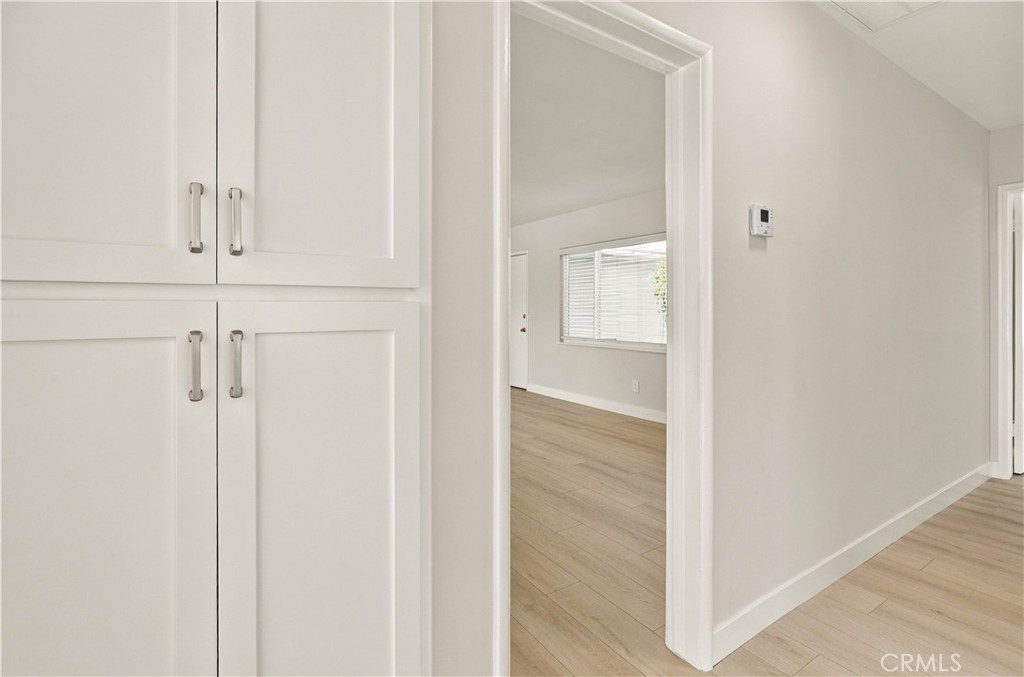 235 East Fromer Street Rialto, CA 92376 - Photo 24 of 40 Hallway Linen Closet with Shaker Style Cabinetry!