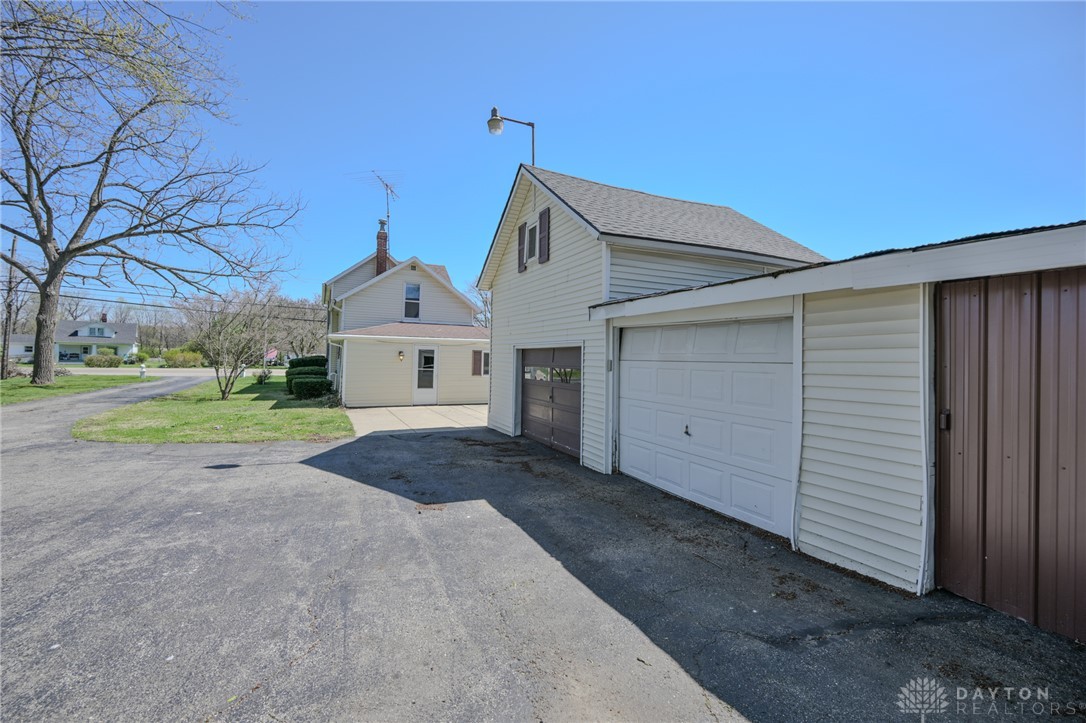 3057 Springfield Xenia Road Springfield, OH 45506 - Photo 32 of 37 Explore this charming property featuring a spacious garage and detached additional structures.