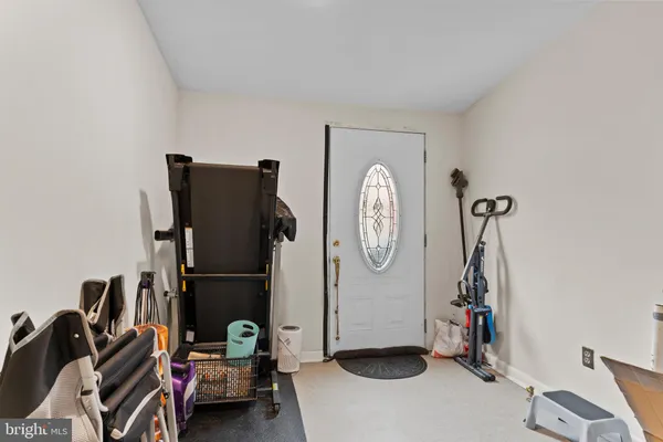 a view of room with gym equipment