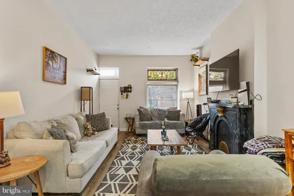 a living room with furniture and a couch