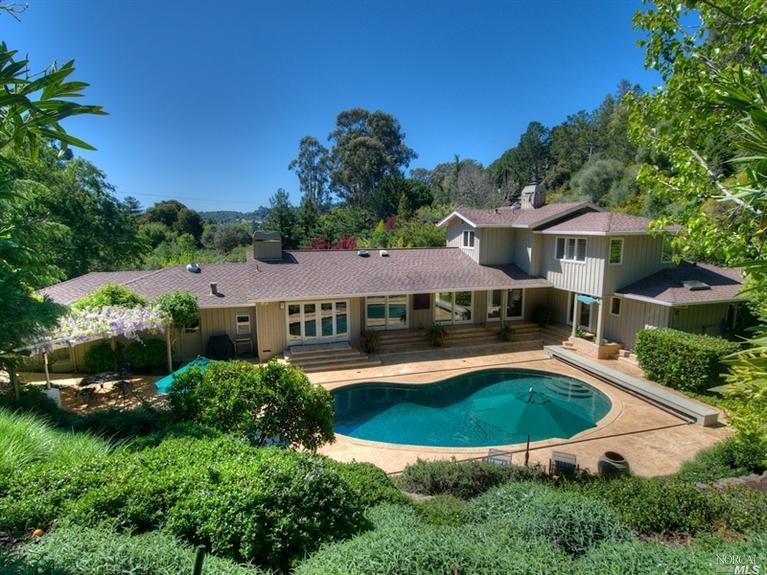 36 Pigeon Hollow Road San Rafael, CA 94901 - Photo 1 of 1 an aerial view of a house with swimming pool garden and patio
