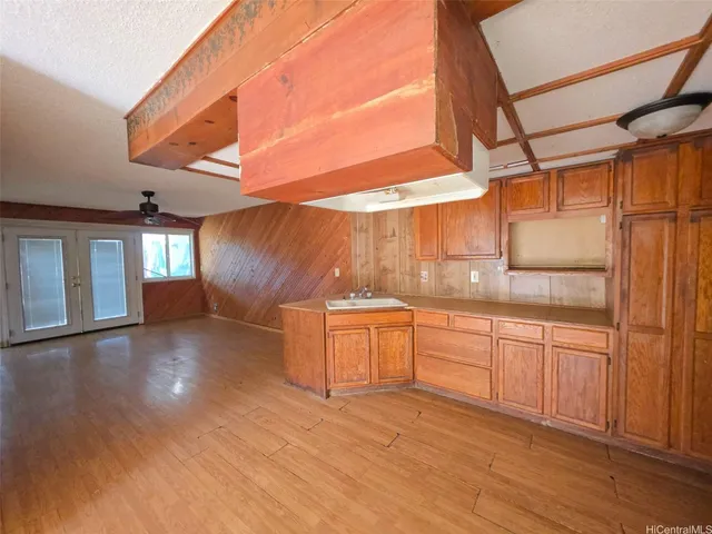 a view of a bathroom with a sink and dishwasher