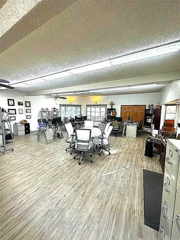 a living room with lots of furniture and a view of living room