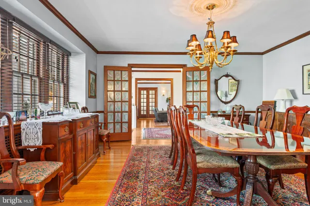 a kitchen with a sink counter top space appliances and cabinets
