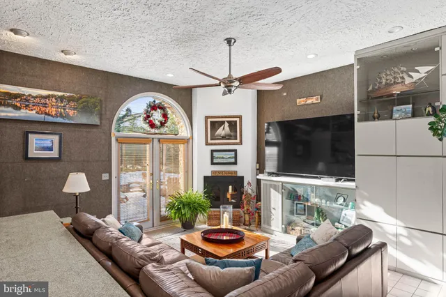 a view of entryway with wooden floor and stairs