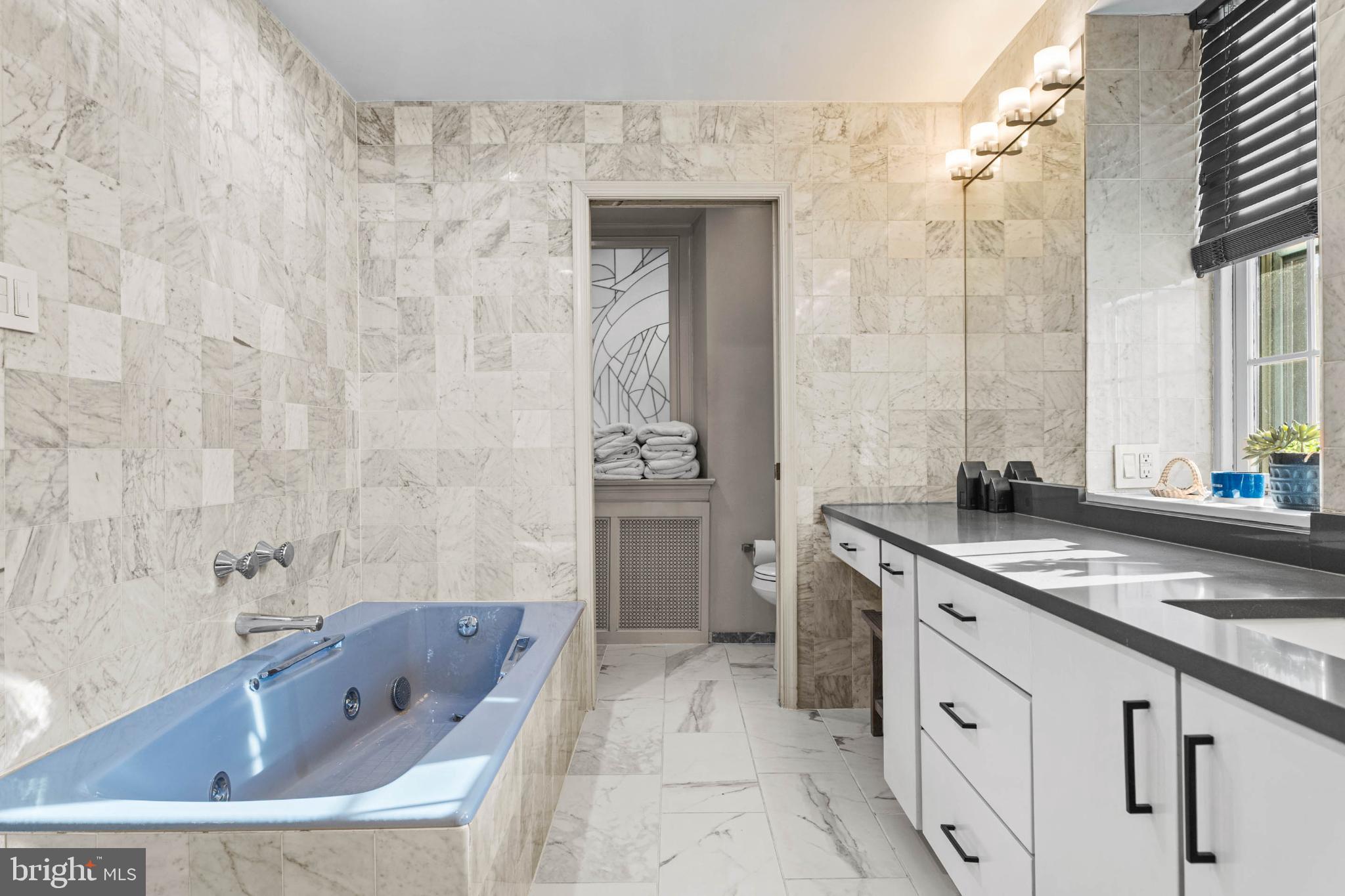 1432 Noble Road Rydal, PA 19046 - Photo 39 of 69 a bathroom with a granite countertop sink a toilet and bathtub