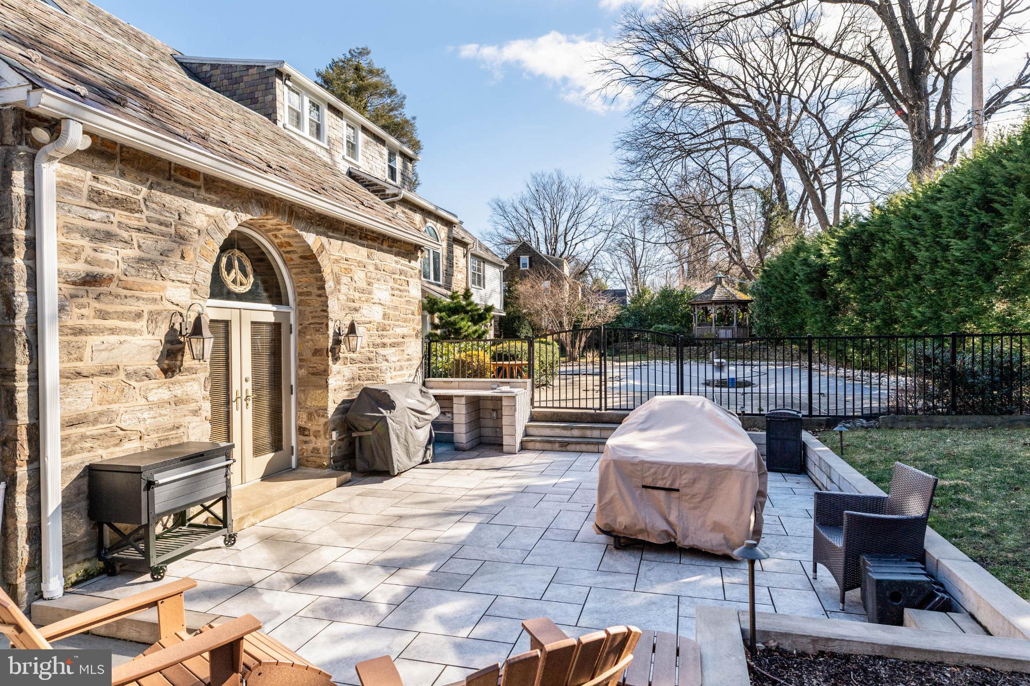 1432 Noble Road Rydal, PA 19046 - Photo 4 of 69 a view of a patio with couches and a fire pit