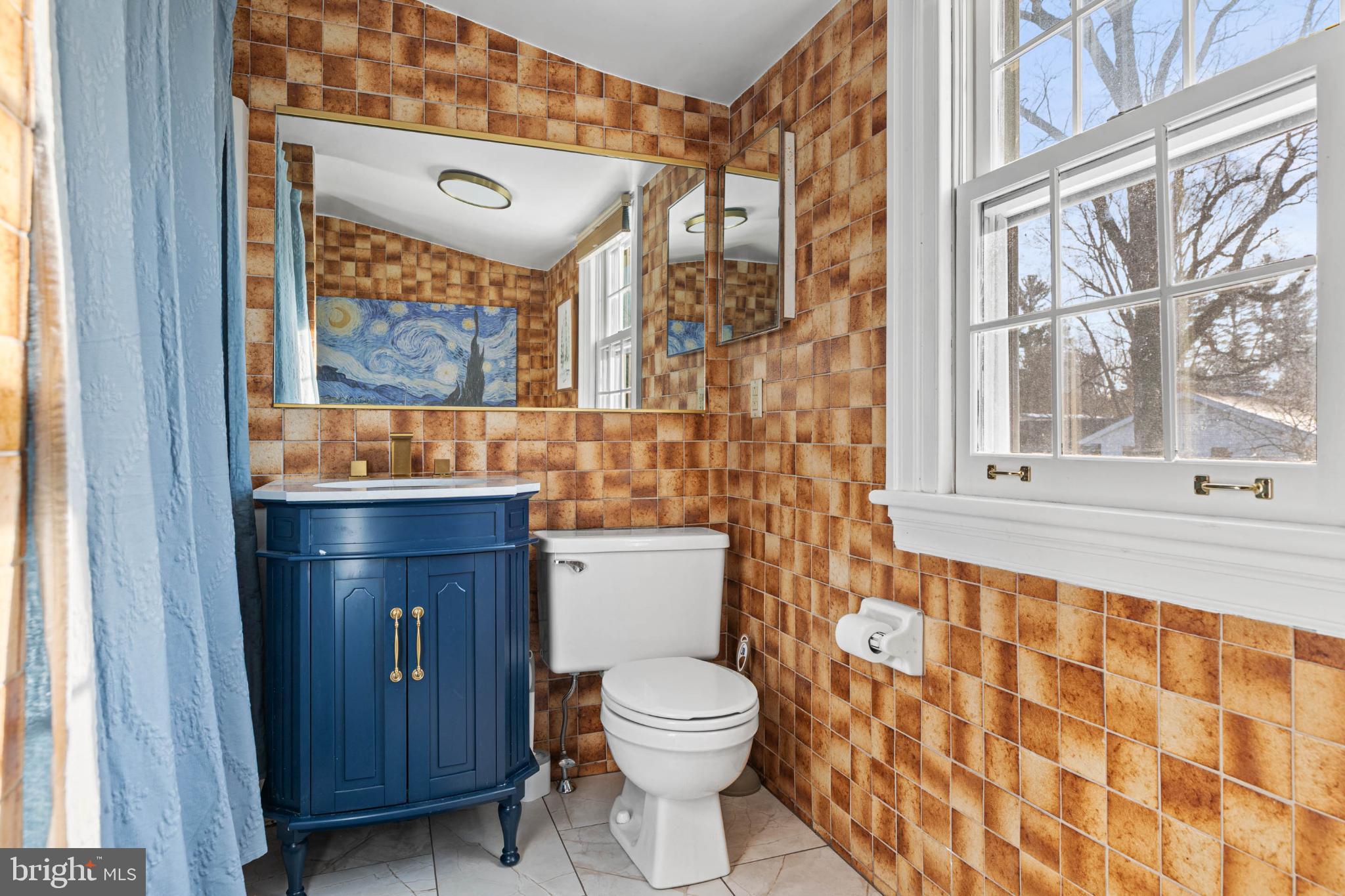 1432 Noble Road Rydal, PA 19046 - Photo 51 of 69 a bathroom with a toilet sink and mirror