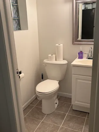 a bathroom with a toilet and a sink