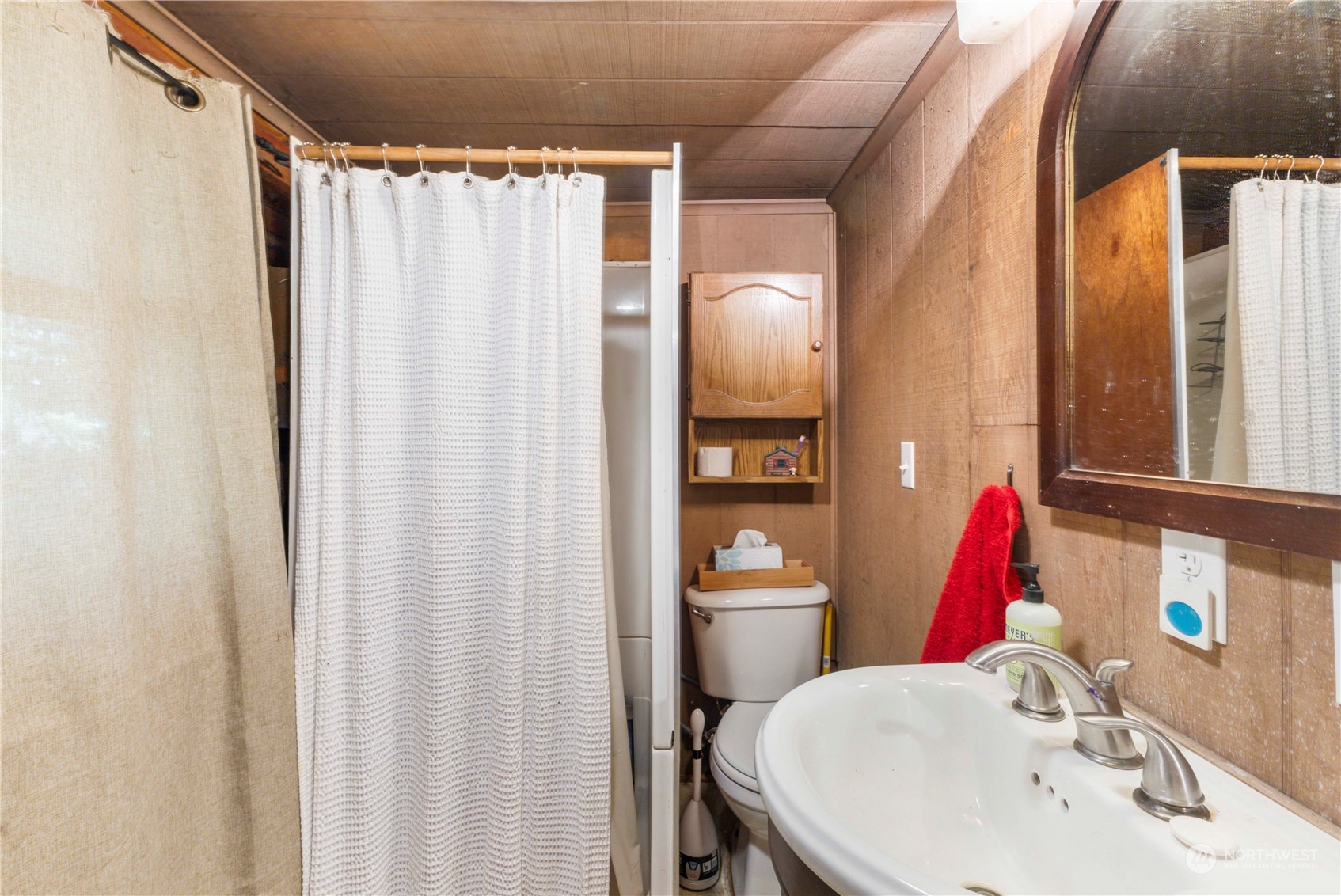 158 Usfs 7175 Road Enumclaw, WA 98022 - Photo 16 of 23 a bathroom with a sink and a mirror