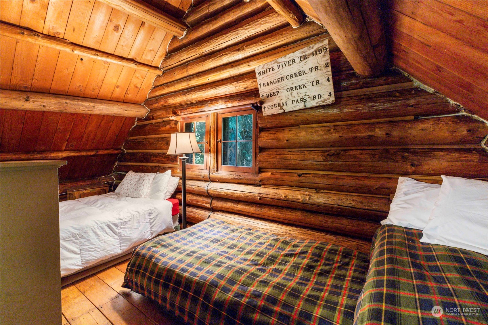 158 Usfs 7175 Road Enumclaw, WA 98022 - Photo 19 of 23 a bedroom with bed and wooden floor