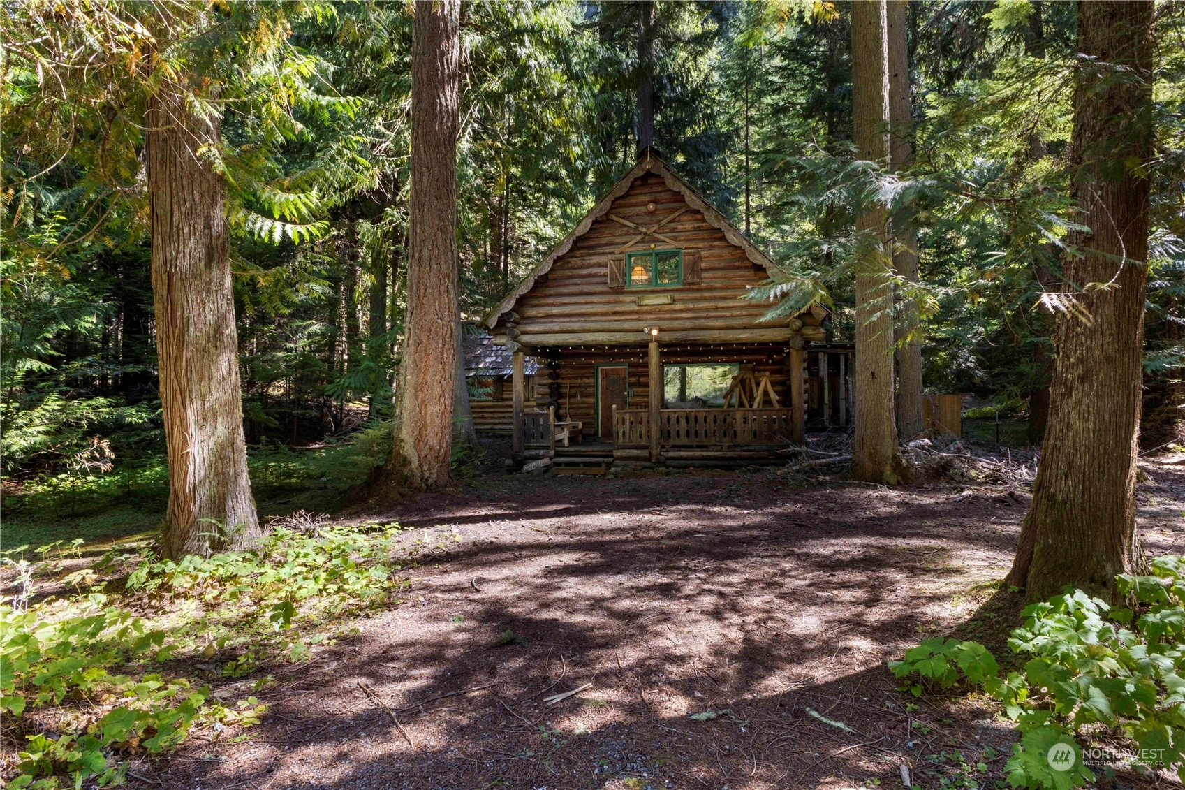 158 Usfs 7175 Road Enumclaw, WA 98022 - Photo 21 of 23 a front view of a house with garden