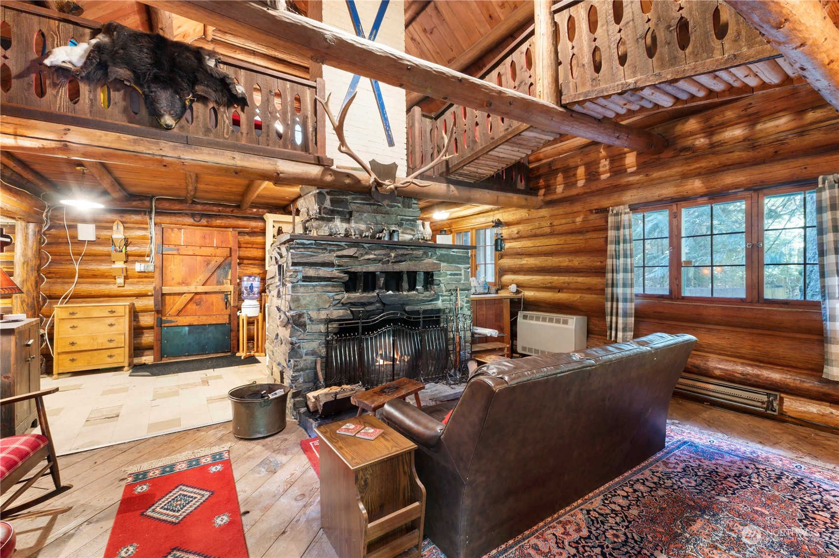 158 Usfs 7175 Road Enumclaw, WA 98022 - Photo 4 of 23 a living room with furniture a fireplace and wooden floor