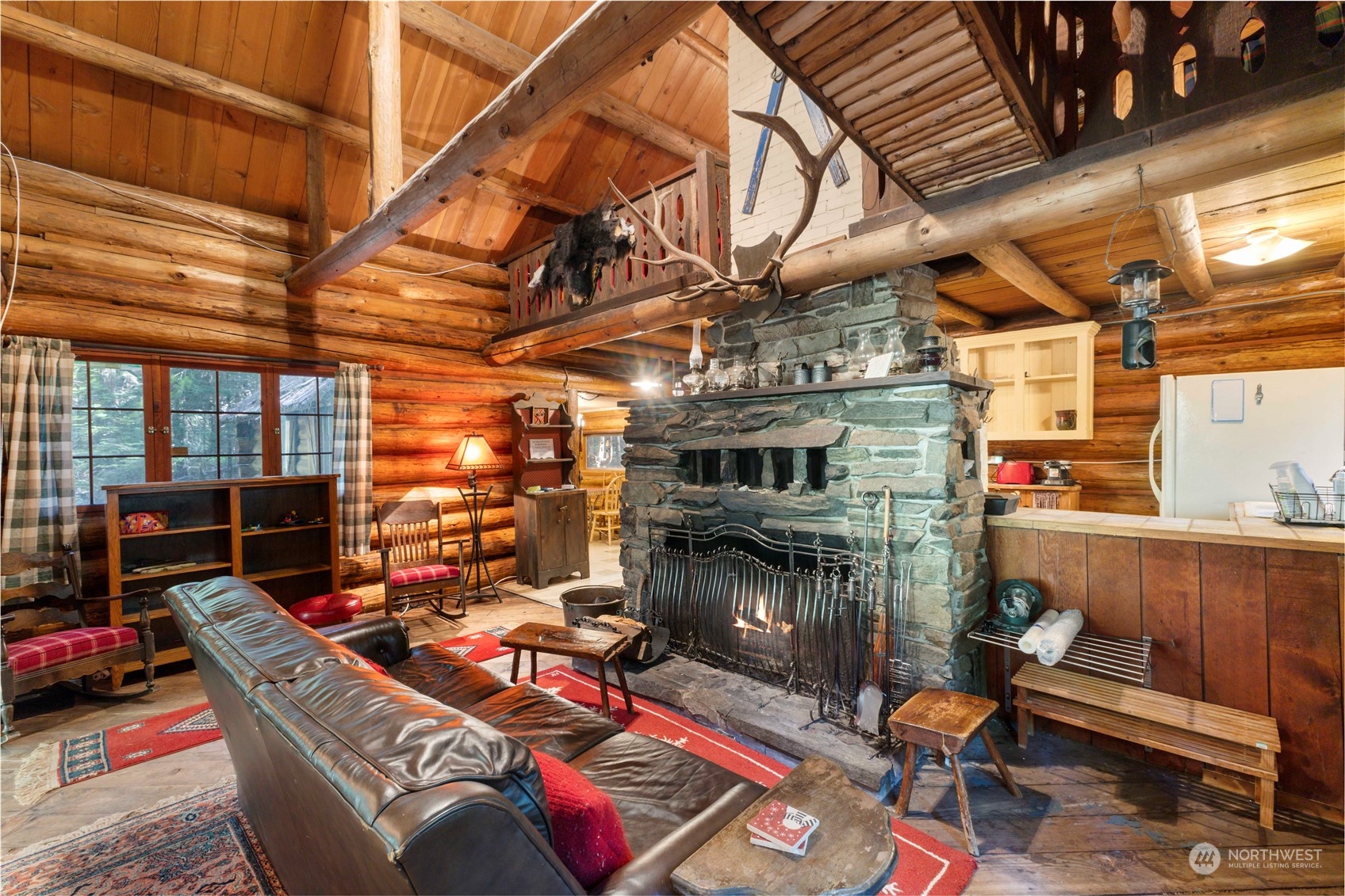158 Usfs 7175 Road Enumclaw, WA 98022 - Photo 5 of 23 a living room with furniture and a fireplace