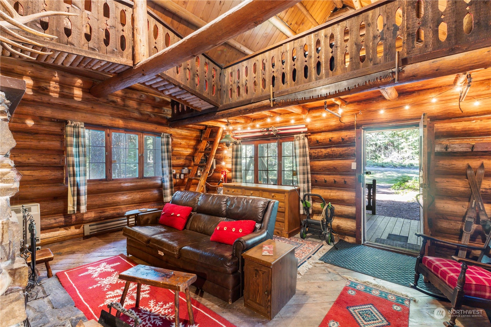 158 Usfs 7175 Road Enumclaw, WA 98022 - Photo 6 of 23 a living room with furniture and a floor to ceiling window