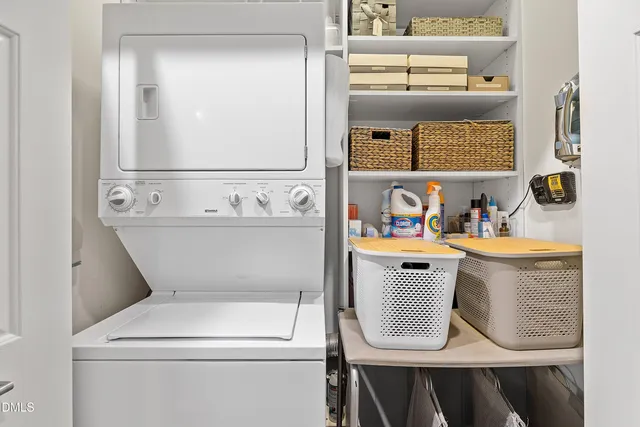 a bathroom with a sink toilet and mirror