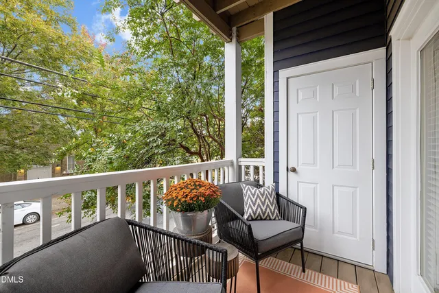 a view of a porch with furniture