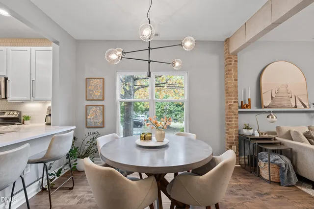 a view of a dining room with furniture window and outside view