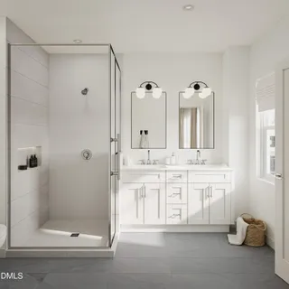 a bathroom with a double vanity sink mirror and shower