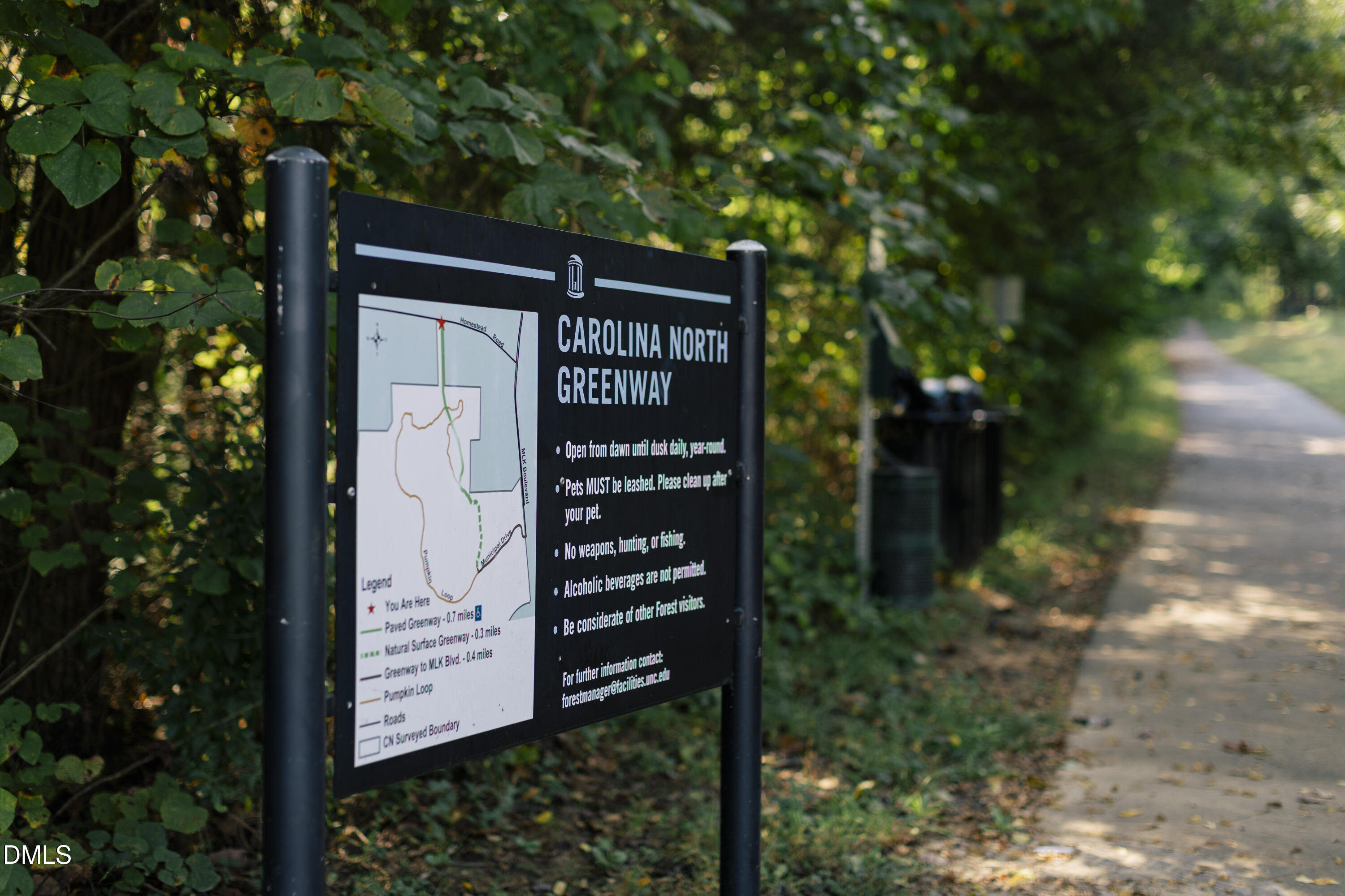 1143 Booth Park Boulevard Chapel Hill, NC 27514 - Photo 30 of 31 a sign on the side of a road