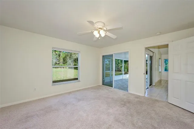 a view of a bathroom with sink and mirror