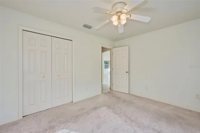 a house with trees in the background