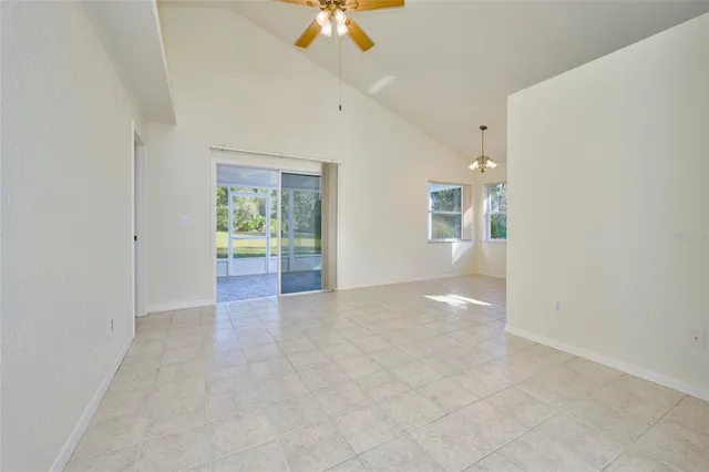 wooden floor in an empty room and a window