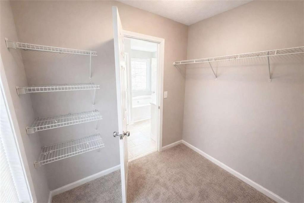118 Chippewa Run Auburn, GA 30011 - Photo 14 of 26 a view of an empty walk in closet