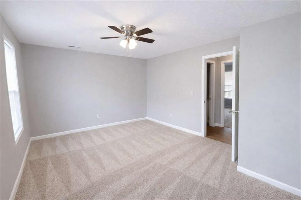 118 Chippewa Run Auburn, GA 30011 - Photo 16 of 26 a view of an empty room with a window