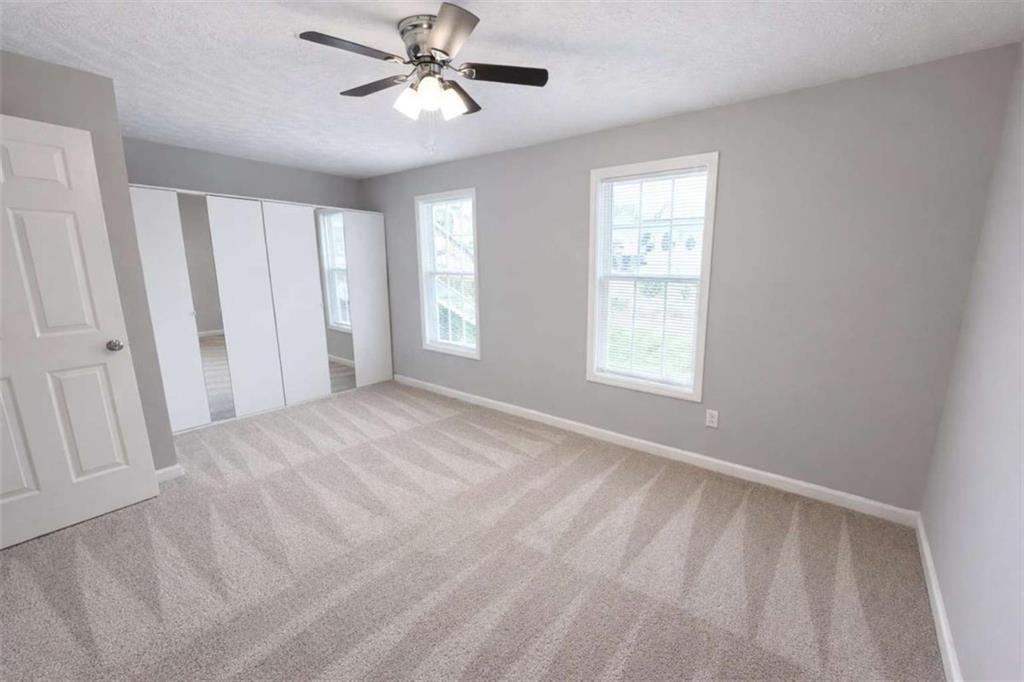 118 Chippewa Run Auburn, GA 30011 - Photo 20 of 26 a view of an empty room with a window