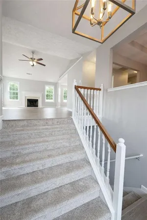 a view of an entryway with a ceiling fan