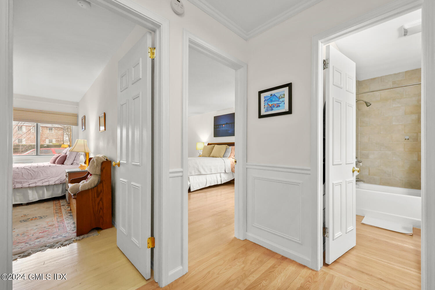 76 Maple Tree Avenue, Unit 3 Stamford, CT 06906 - Photo 11 of 33 a view of a bedroom bathroom and glass door