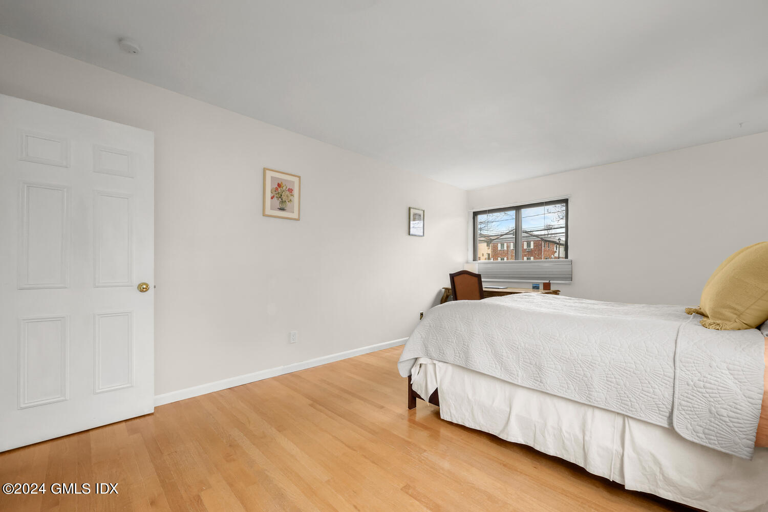 76 Maple Tree Avenue, Unit 3 Stamford, CT 06906 - Photo 18 of 33 a bedroom with a bed and window