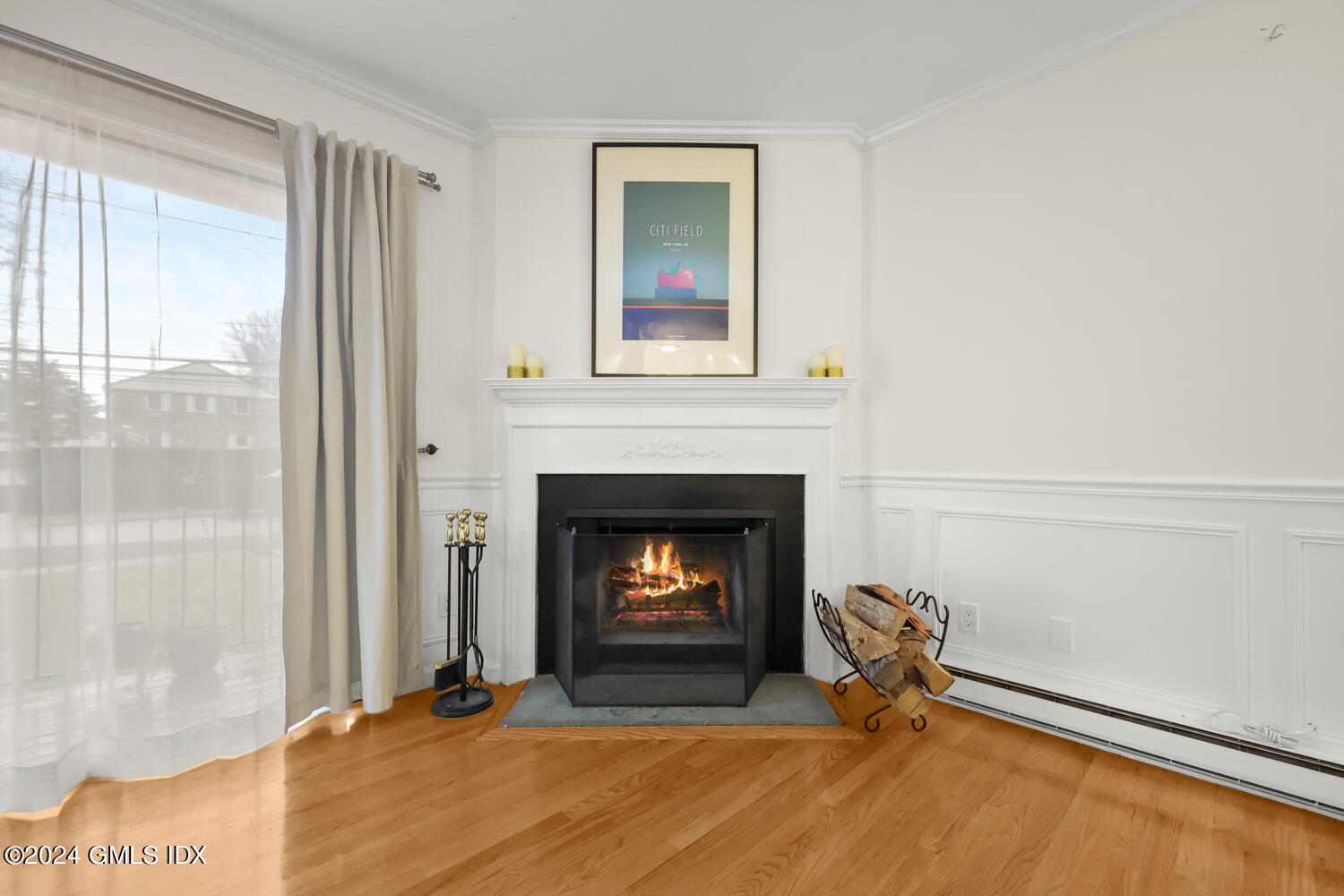 76 Maple Tree Avenue, Unit 3 Stamford, CT 06906 - Photo 5 of 33 a living room with a fireplace