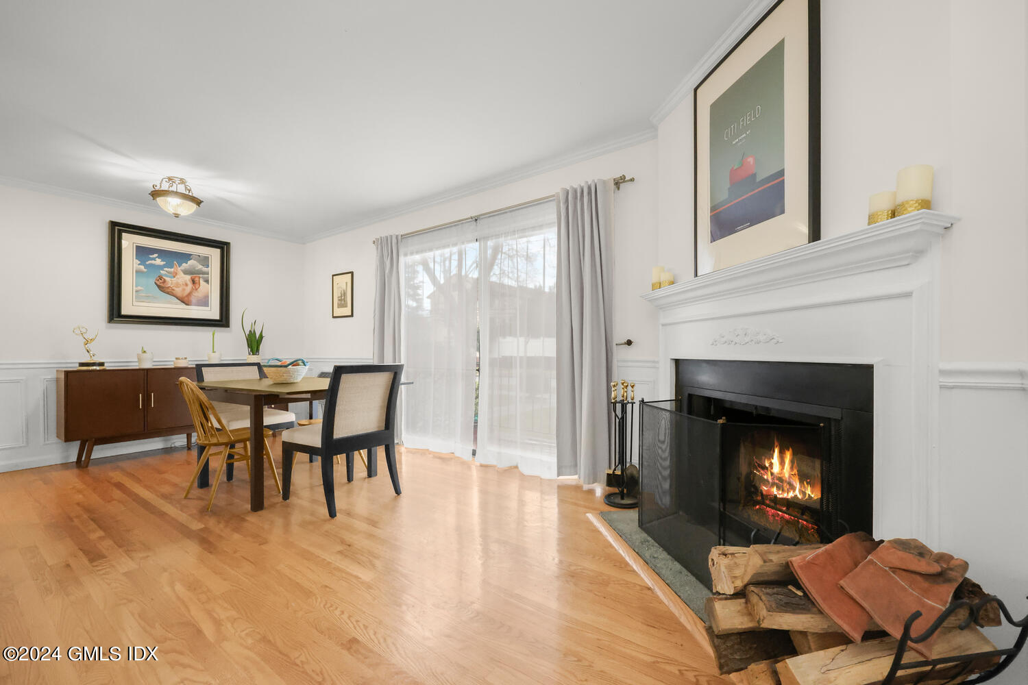 76 Maple Tree Avenue, Unit 3 Stamford, CT 06906 - Photo 6 of 33 a view of a livingroom with furniture and a fireplace