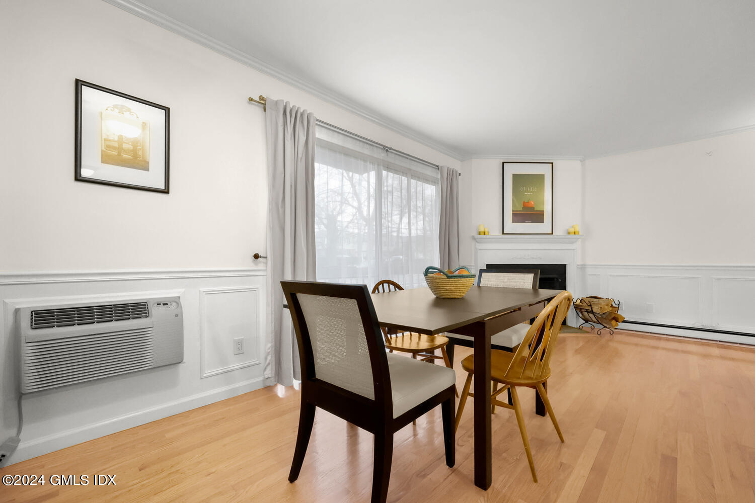 76 Maple Tree Avenue, Unit 3 Stamford, CT 06906 - Photo 9 of 33 a view of a dining room with furniture and a window