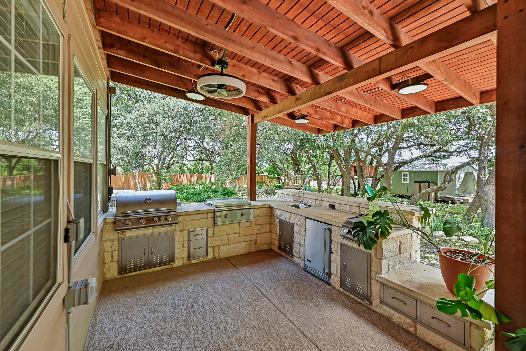 104 North Sumac Lane Georgetown, TX 78633 - Photo 1 of 40 An inviting outdoor kitchen offers the perfect setting for alfresco dining and entertaining.