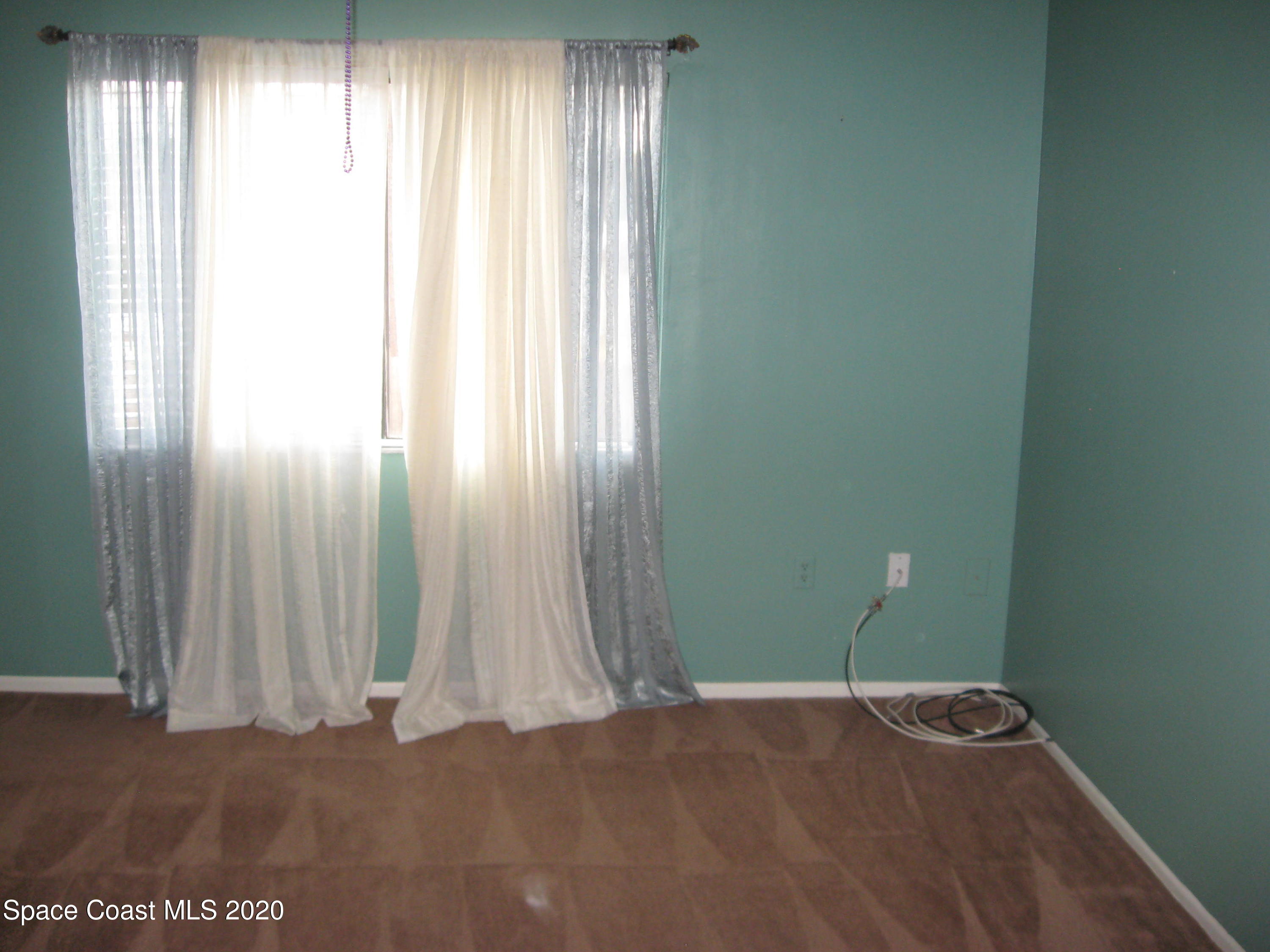 4795 Sisson Road Titusville, FL 32780 - Photo 13 of 27 Master Bedroom