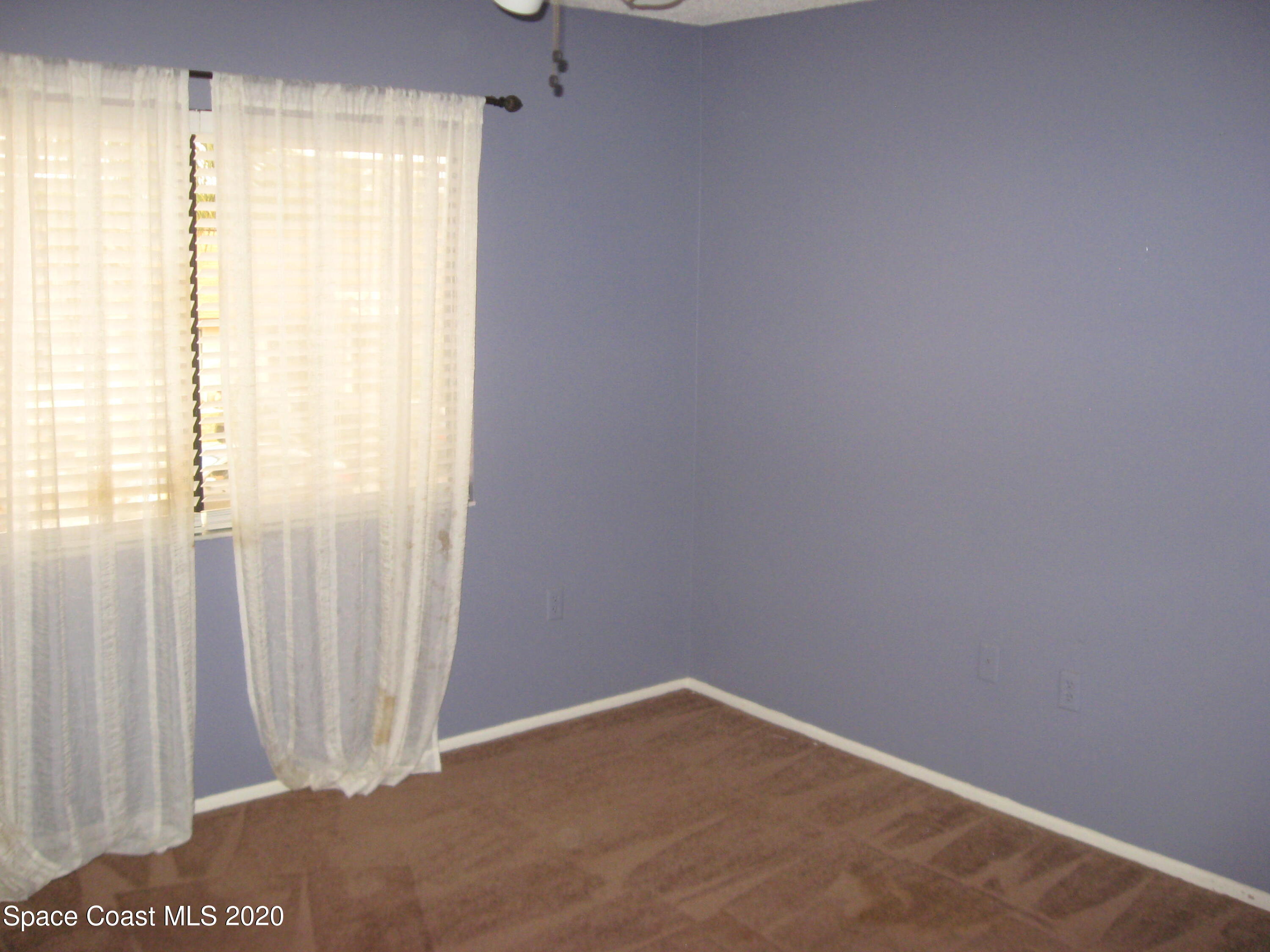 4795 Sisson Road Titusville, FL 32780 - Photo 15 of 27 Second Bedroom
